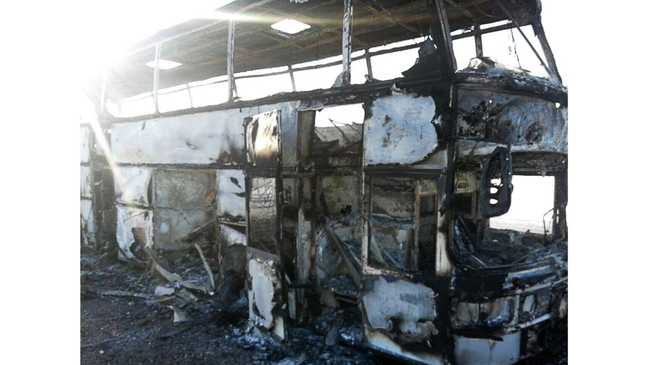 The charred remains of the bus on Thursday.