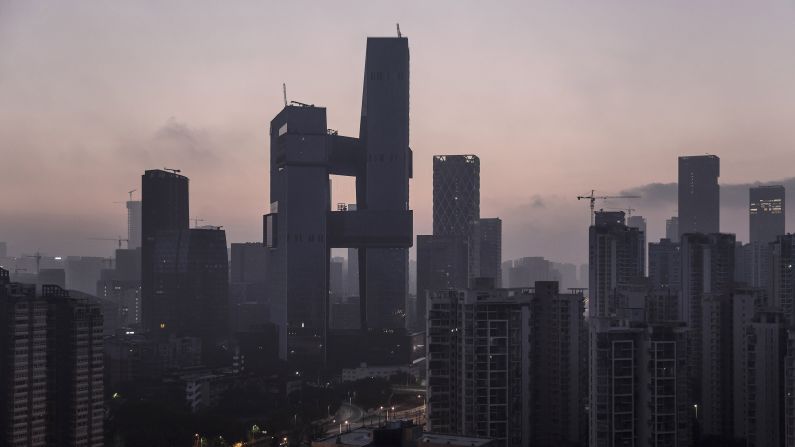 Tencent's headquarters, center left, in Shenzhen, China. The  building was part of a $599 million project aimed at creating a campus-like atmosphere for the urban setting. 