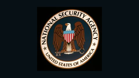The seal of the National Security Agency (NSA) hangs at the Threat Operations Center inside the NSA. 