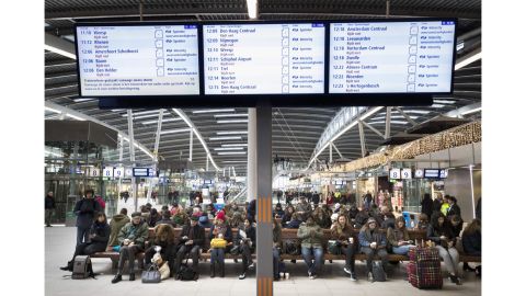 Passengers wait at Utrecht Central Station in the Netherlands as windstorms forced the cancelation of train services Thursday. 