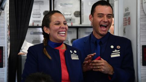Crew members Paula Podest and Carlos Ciuffardi celebrate after being married by Pope Francis.