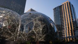 Attendees gather outside of the Amazon.com Inc. Spheres ahead of the company's product reveal launch event in downtown Seattle, Washington, U.S., on Wednesday, Sept. 27, 2017. Amazon will unveil new gadgets at an event in Seattle, joining the rush of technology products vying for consumers' attention as the holiday shopping season approaches. Photographer: Daniel Berman/Bloomberg via Getty Images