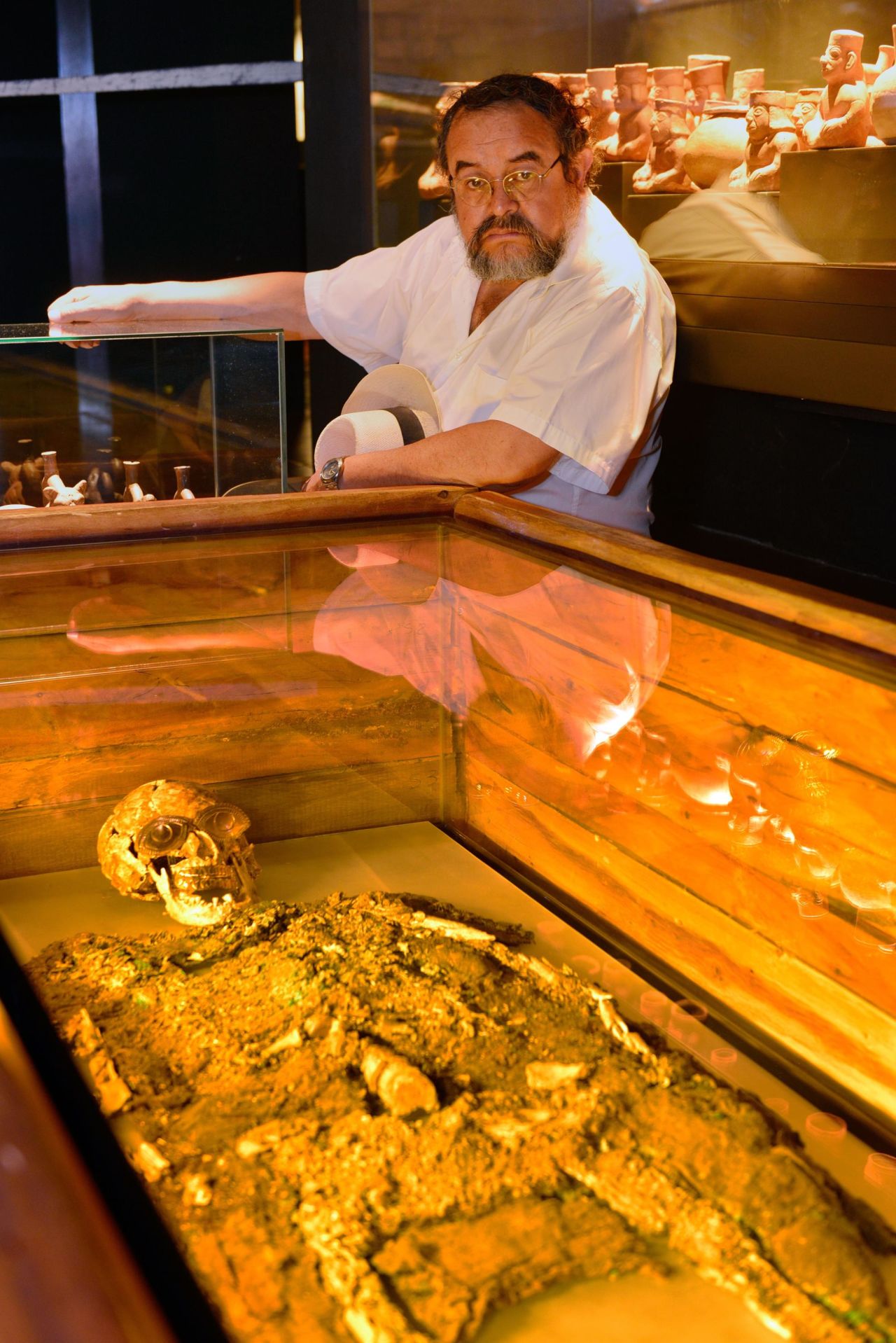 Alva stands next to the remains of the Lord of Sipan at the Royal Tomb Museum in Lambayeque. The Moche lord has been described as the richest intact pre-Columbian tomb in the Western Hemisphere.