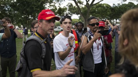 Pro-Trump supporters argue with an anti-fascist demonstrator at the "Mother of all Rallies" (MOAR) event on the National Mall in Washington, D.C., U.S., on Saturday, Sept. 16, 2017.