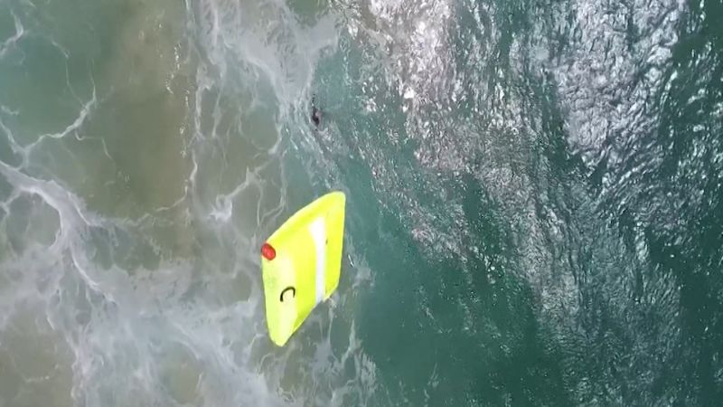 NextImg:Watch a drone save two swimmers in Australia | CNN Business