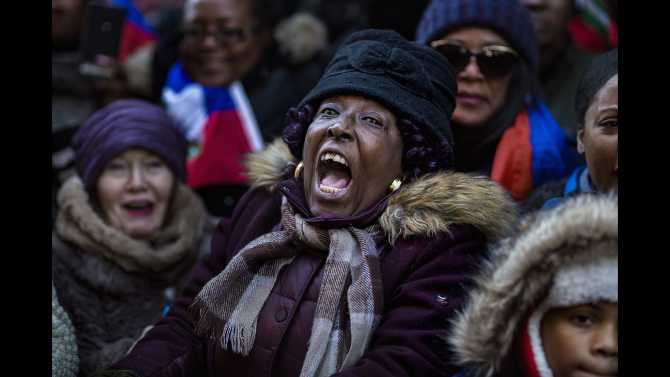 A woman joins in an anti-racism rally in New York on Monday, January 15, in response to<a href="http://www.cnn.com/2018/01/11/politics/immigrants-shithole-countries-trump/index.html"> President Donald Trump's reported comments</a> disparaging Haiti and African nations. The remarks at a closed-door White House meeting on immigration set off <a href="http://www.cnn.com/2018/01/12/politics/trump-shithole-countries-reaction-intl/index.html">a storm of controversy around the world</a>.
