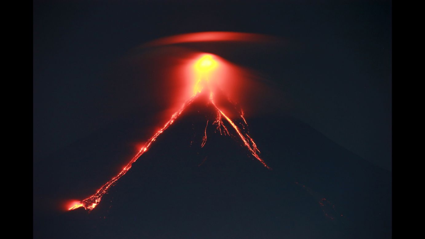 <a href="http://www.cnn.com/2018/01/15/asia/mayon-volcano-alert-level-increased/index.html">The Mayon Volcano</a>, seen from Legazpi, Philippines, spews lava as it erupts on Monday, January 15. It's the most active volcano in the Philippines.