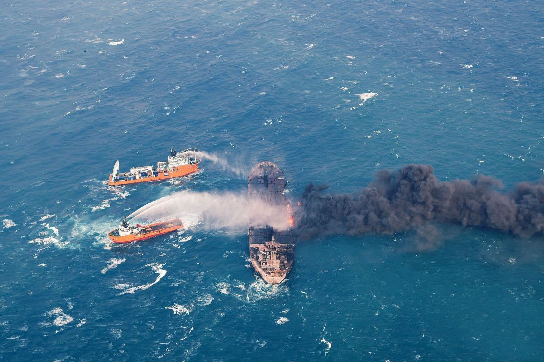 In this January 10 photo provided by China's Ministry of Transport, firefighting boats work to put on a blaze on the oil tanker Sanchi in the East China Sea off the eastern coast of China. 