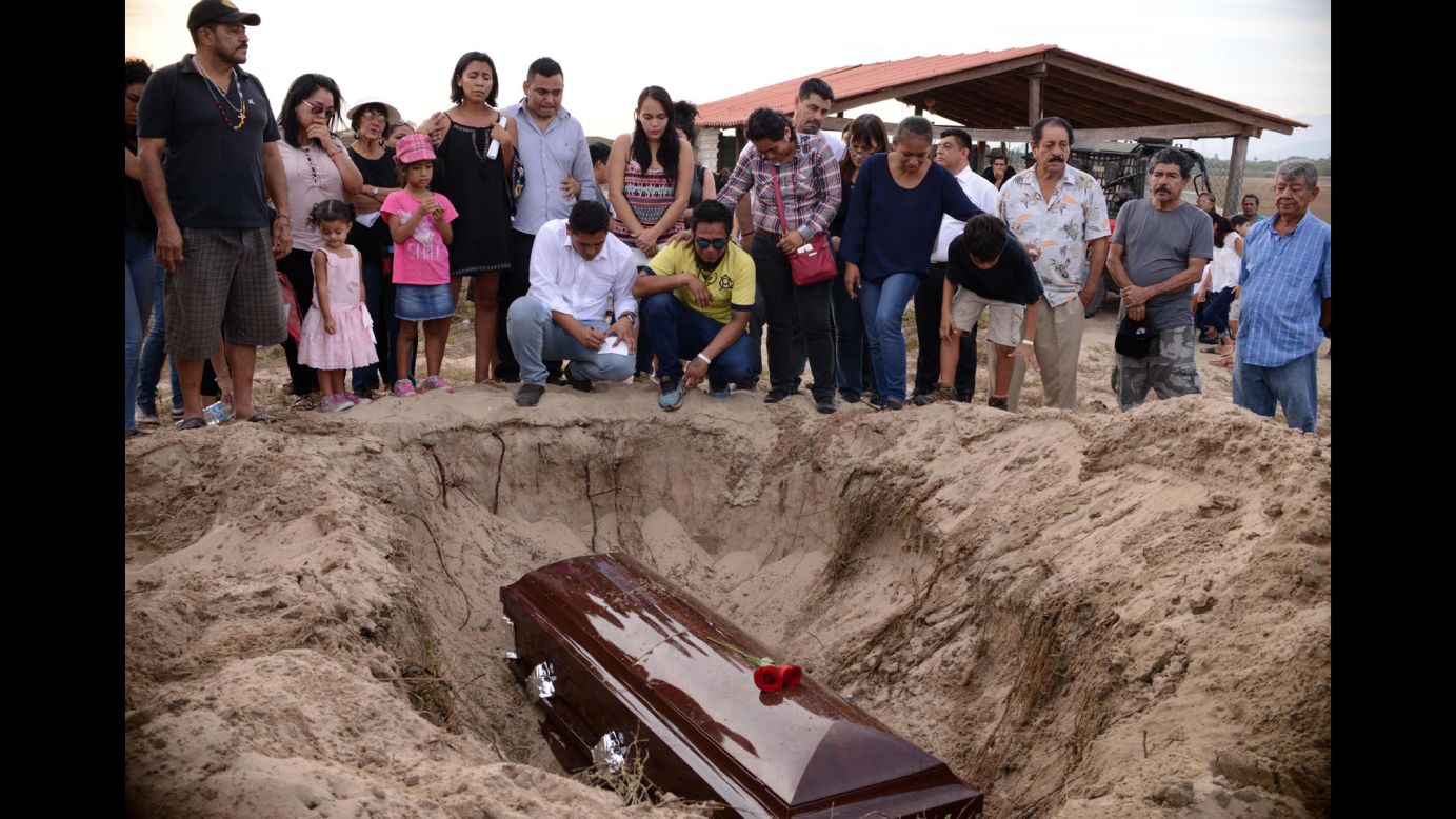 Relatives of slain Mexican journalist Carlos Dominguez Rodriguez attend his funeral in Tecpán de Galeana, Mexico, on Wednesday, January 17. Mexico is the most dangerous country in the Western Hemisphere for journalists, <a href="https://cpj.org/2018/01/mexican-journalist-killed-in-tamaulipas.php" target="_blank" target="_blank">according to the Committee to Protect Journalists</a>.