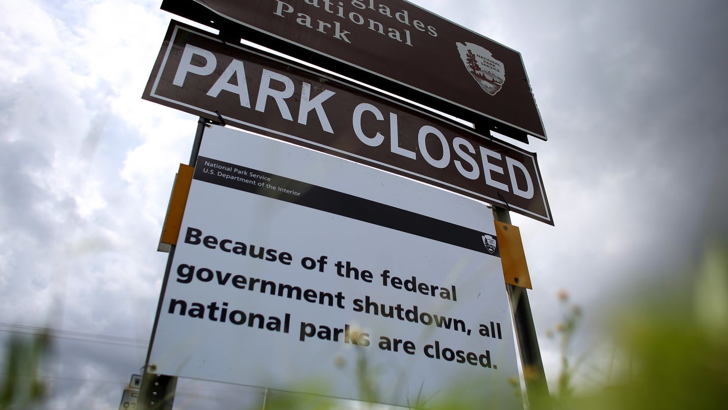 A sign near the entrance to the Everglades National Park is seen indicating it is closed on October 7, 2013 in Miami, Florida. 