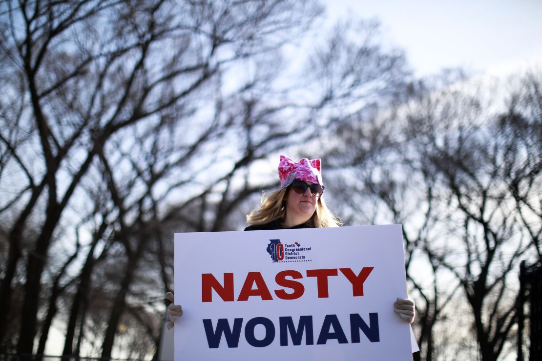 A woman holds a sign that reads "Nasty Woman" -- a reference to what Donald Trump said about his opponent, Hillary Clinton, during a presidential debate -- during a demonstration in Chicago.