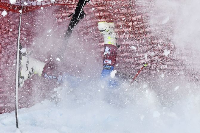 <strong>...Gone:</strong> American skier Jared Goldberg hits the safety nets on the difficult Streif run in Kitzbuhel.