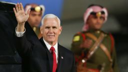 US Vice President Mike Pence waves after leaving Air Force Two upon his arrival in the Jordanian capital Amman, late on January 20, 2018.