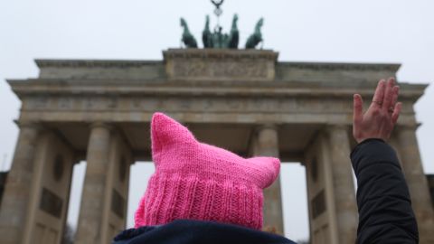 An activist with a "pink pussy hat" participates in front of the Brandenburg Gate in a demonstration for women's rights on January 21, 2018, in Berlin, Germany. 