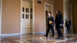 Senate Majority Leader Mitch McConnell, R-Ky., leaves his office to open the Senate chamber in the Capitol as the government shutdown continues on Sunday, Jan. 21, 2018.