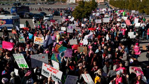 People attend the Women's March on Sunday in Las Vegas. 