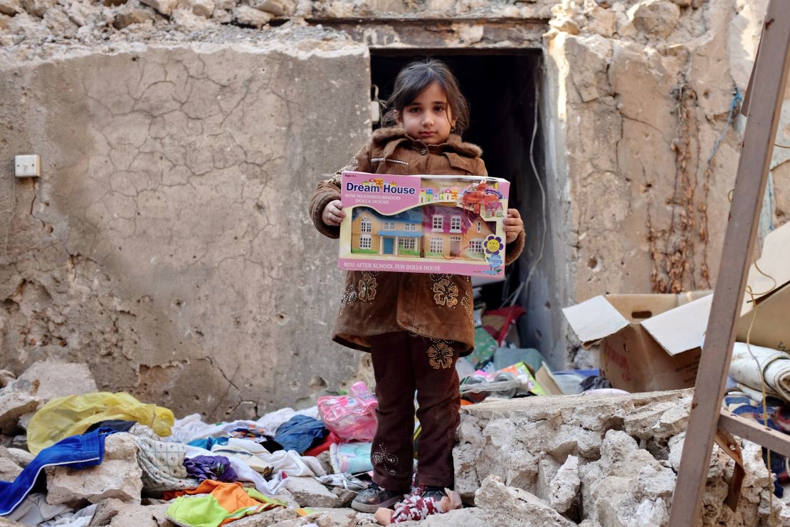 Five-year-old Ru'aa said this doll house was the most precious thing she recovered from the rubble of her house in the Old City. "She loves the doll house because she has no home of her own," her father said. "She always asks me, 'Daddy, when will you get me a house?'"