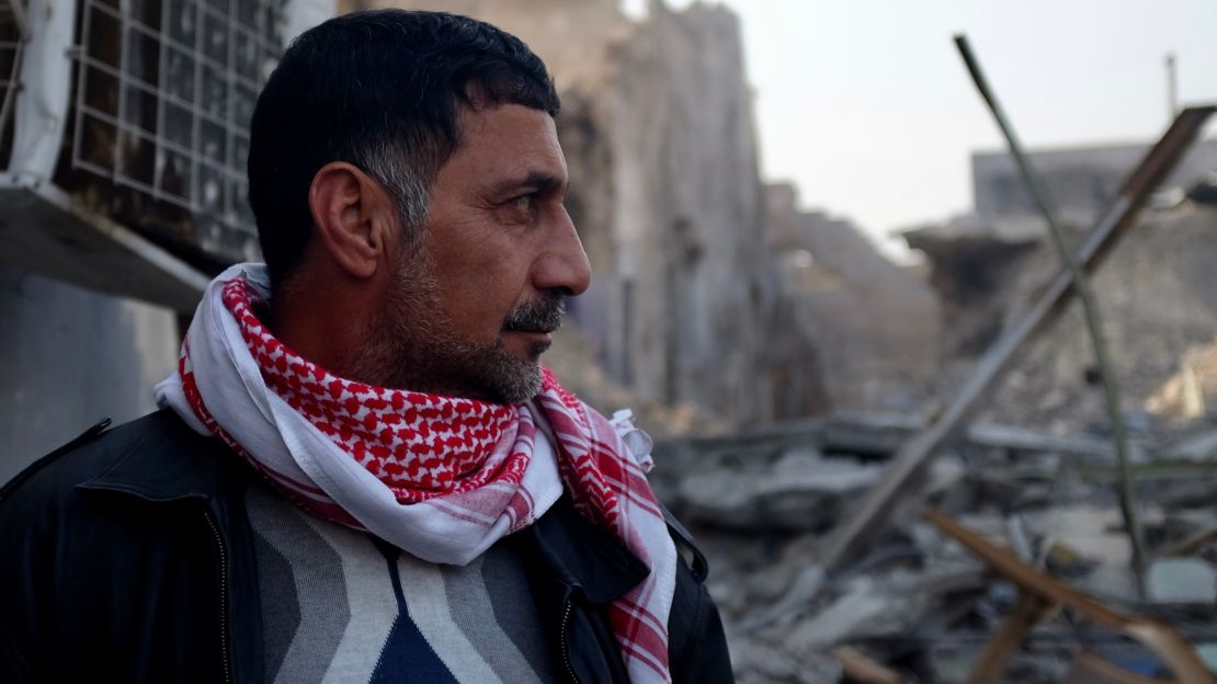 Mahmoud Shuker remembers hastily burying around 100 people in the courtyard of his local mosque as bombs and rockets rained down on his neighborhood. Some families came back after the fighting to exhume their loved ones.  
