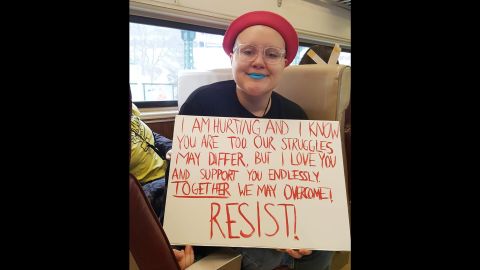 Moss Sherman, 19, rode the Peace Train in New York with Women's March participants on Saturday.