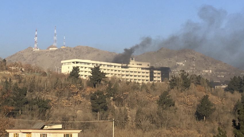 Smokes rises from the Intercontinental Hotel after an attack in Kabul, Afghanistan, Sunday, Jan. 21, 2018. Gunmen stormed the hotel in the Afghan capital on Saturday evening, triggering a shootout with security forces, officials said. (AP Photo/Rahmat Gul)