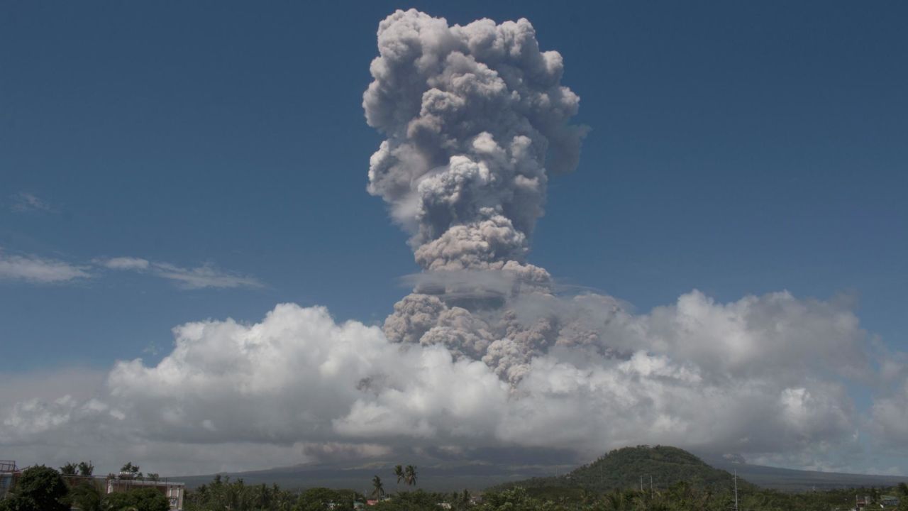 A huge column of ash shoots up to the sky during the eruption of Mayon volcano Monday, Jan. 22, 2018.
