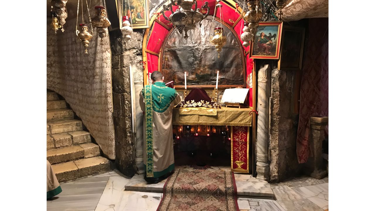 Preparations are made for the Armenian Church Sunday service inside the Grotto at the Church of the Nativity.