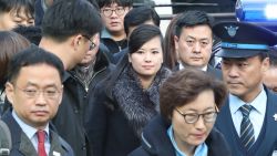Hyon Song-Wol (C), the leader of North Korea's popular Moranbong band, arrives at Seoul station in Seoul on January 21, 2018 before boarding a train bound for the eastern city of Gangneung.
North Korean delegates arrived in Seoul on January 21 on their way to inspect venues and prepare cultural performances for next month's Winter Olympics, in the first visit by Pyongyang officials to the South for four years. / AFP PHOTO / KOREA POOL / - / South Korea OUT        (Photo credit should read -/AFP/Getty Images)