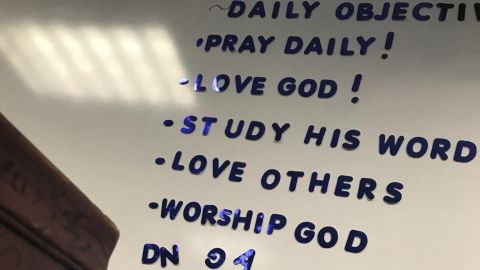 A teacher had these "Daily Objectives" on her wall, the lawsuit says.