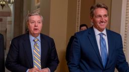 WASHINGTON, DC - JANUARY 20:  (L-R) Senator Lindsey Graham (R-SC) and Senator Jeff Flake (R-AZ) speak to the media on Capitol Hill on January 20, 2018 in Washington, DC. The U.S. government is shut down after the Senate failed to pass a resolution to temporarily fund the government through February 16.  (Photo by Tasos Katopodis/Getty Images)