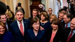 Senators Joe Manchin (D-WV) and Susan Collins (R-ME) lead a group of bipartisan Senators as they speak to reporters after the Senate passed a procedural vote for a continuing resolution to fund the federal government, Capitol Hill, January 22, 2018 in Washington, DC. Lawmakers are continuing to seek a deal to end the government shutdown, now in day three. (Photo by Drew Angerer/Getty Images)