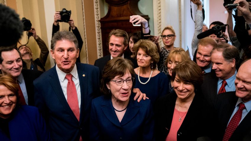 Senators Joe Manchin (D-WV) and Susan Collins (R-ME) lead a group of bipartisan Senators as they speak to reporters after the Senate passed a procedural vote for a continuing resolution to fund the federal government, Capitol Hill, January 22, 2018 in Washington, DC. Lawmakers are continuing to seek a deal to end the government shutdown, now in day three. (Photo by Drew Angerer/Getty Images)