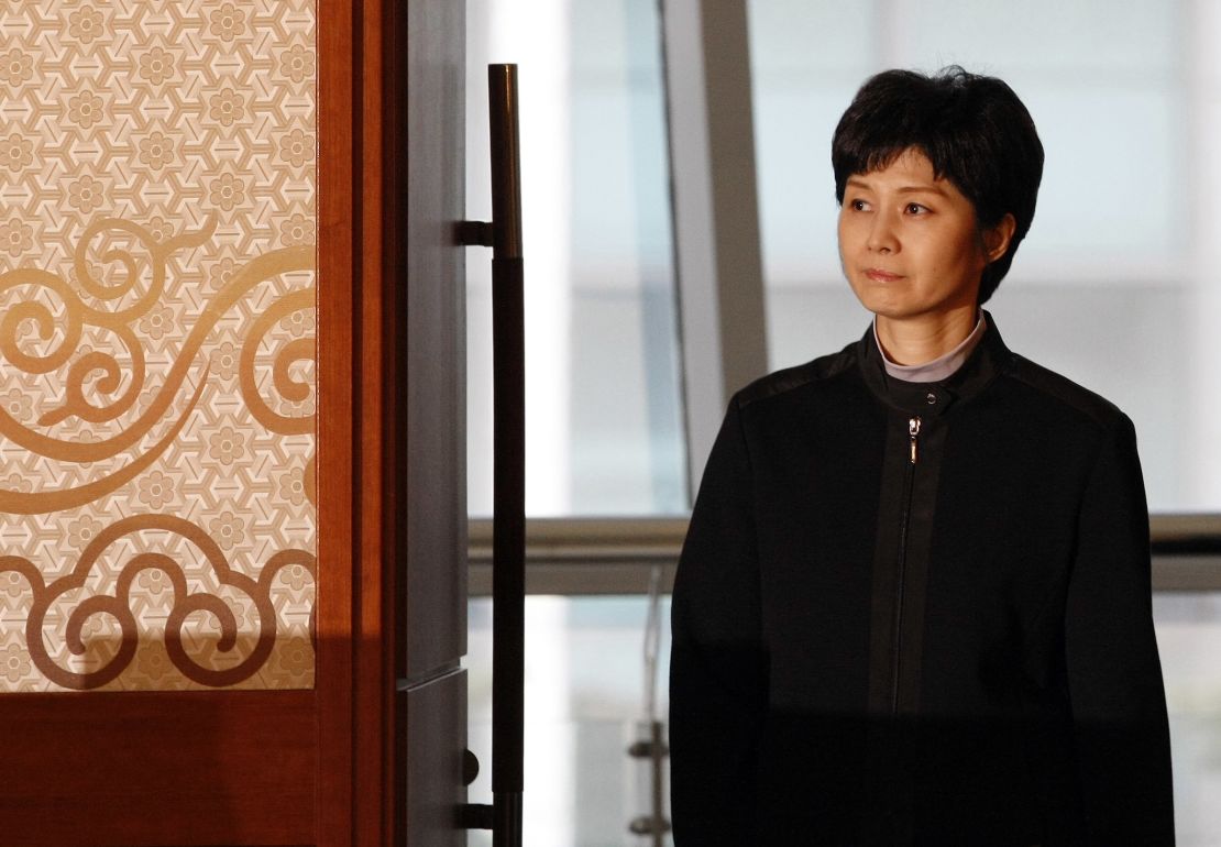 Former North Korean spy Kim Hyon Hui arrives for a press conference with Shigeo Iizuka and Koichiro Iizuka, family members of Yaeko Taguchi, on March 11, 2009. 