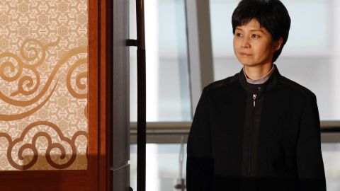 Former North Korean spy Kim Hyon Hui arrives for a press conference with Shigeo Iizuka and Koichiro Iizuka, family members of Yaeko Taguchi, on March 11, 2009.