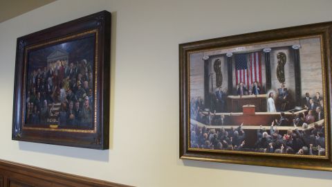 Landry has paintings of Moses and Jesus in his direct eyeline.