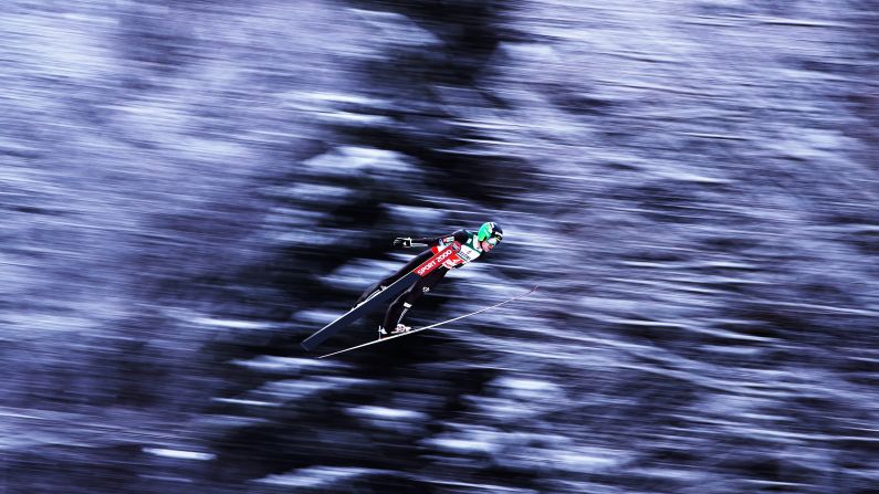 Andreas Wellinger soars through the air during his first competition jump of the Flying Hill Team competition of the Ski Flying World Championships on Sunday, January 21, in Oberstdorf, Germany. <br />