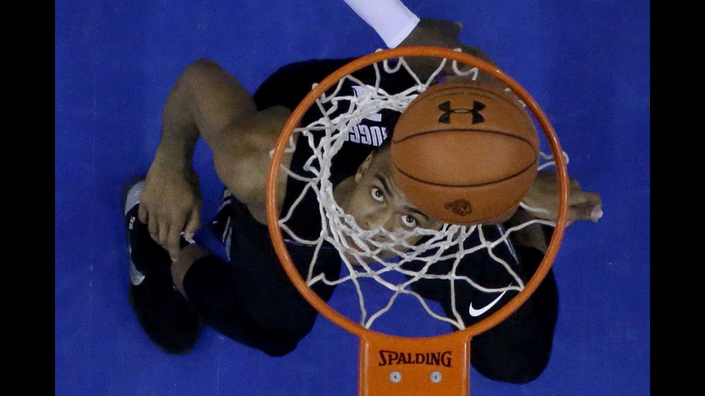 Xavier guard Paul Scruggs watches his shot enter the hoop during the first half of an NCAA college basketball game against Seton Hall on Saturday, January 20, in Newark, New Jersey. Xavier won 73-64 against Seton Hall. 