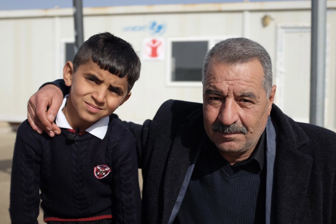 Ayman with his uncle, Tahsin Elias, who is now his guardian. 