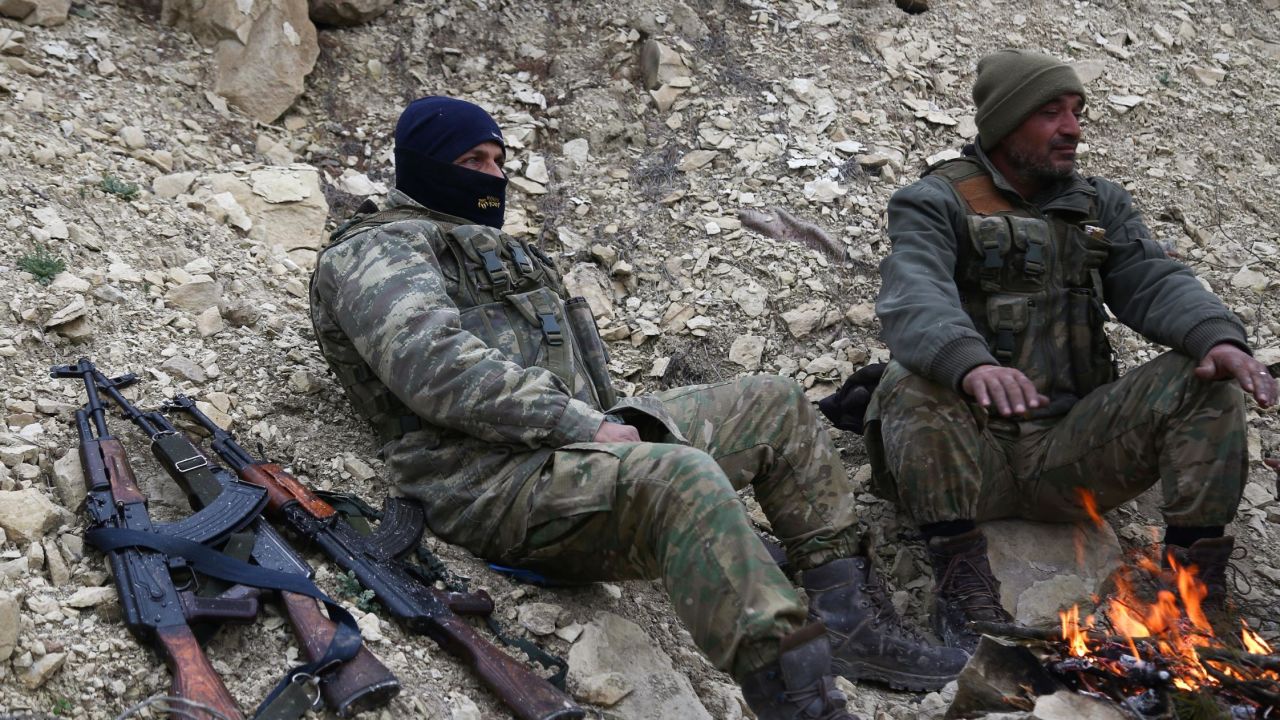 Turkish-backed Syrian fighters at Mount Bersaya on Monday.