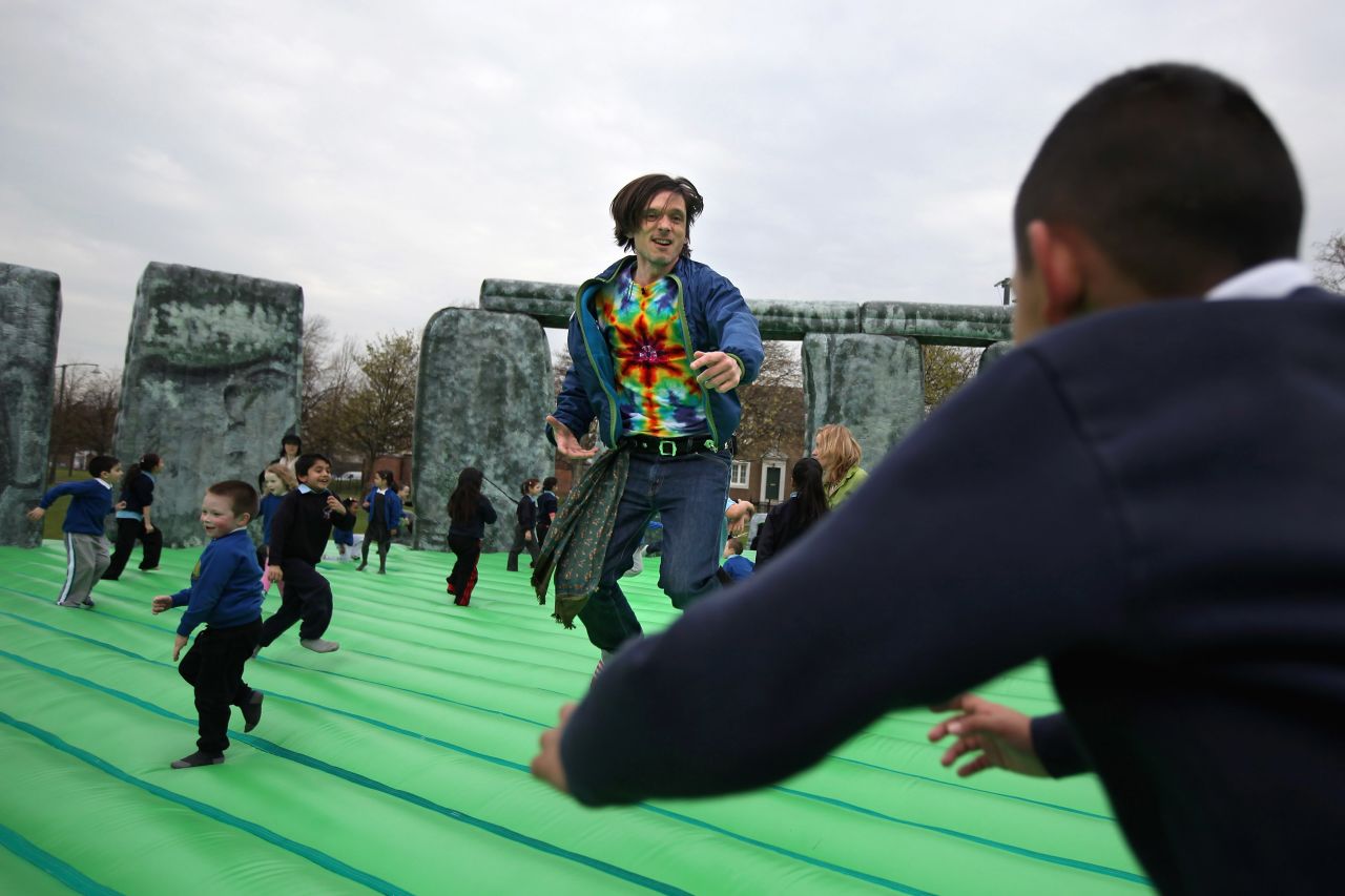 Deller bounces on his artwork "Sacrilege" at the Glasgow International Festival of Visual Arts in 2012.