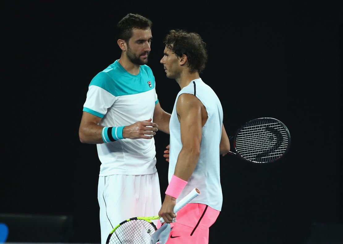 Rafael Nadal and Marin Cilic exchange a handshake. 