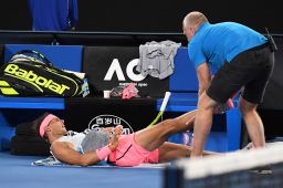 Rafael Nadal receives a medical timeout. 