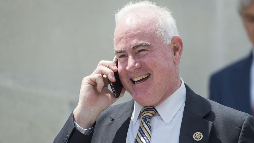UNITED STATES - MAY 25: Rep. Pat Meehan, R-Pa., talks on his phone as he walks down the House steps following votes in the Capitol on Wednesday, May 25, 2016. (Photo By Bill Clark/CQ Roll Call)