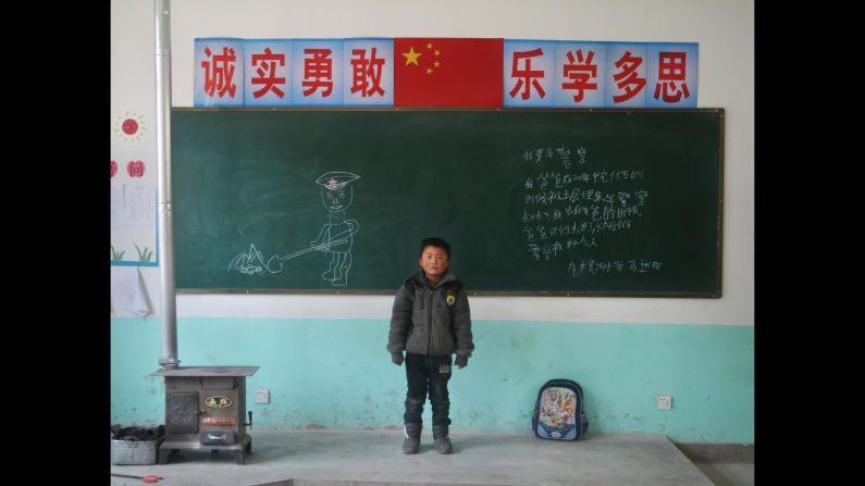 Ma Jincai, 7, Bulenggou Elementary School, Gansu. "I want to be a policeman. My dad was buried in 2011 when he was digging coal."<br />
