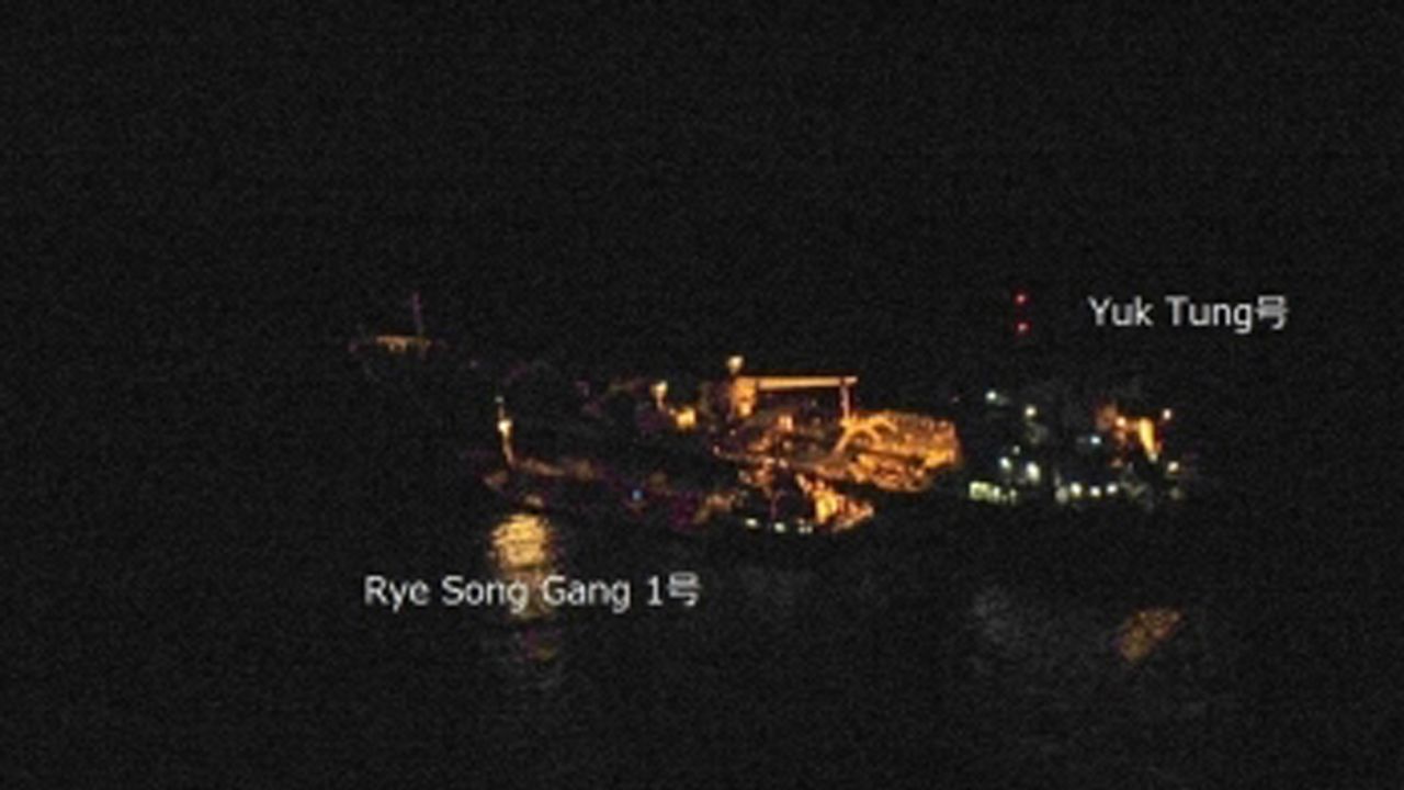 The Rye Song Gang 1 beside another ship in January.