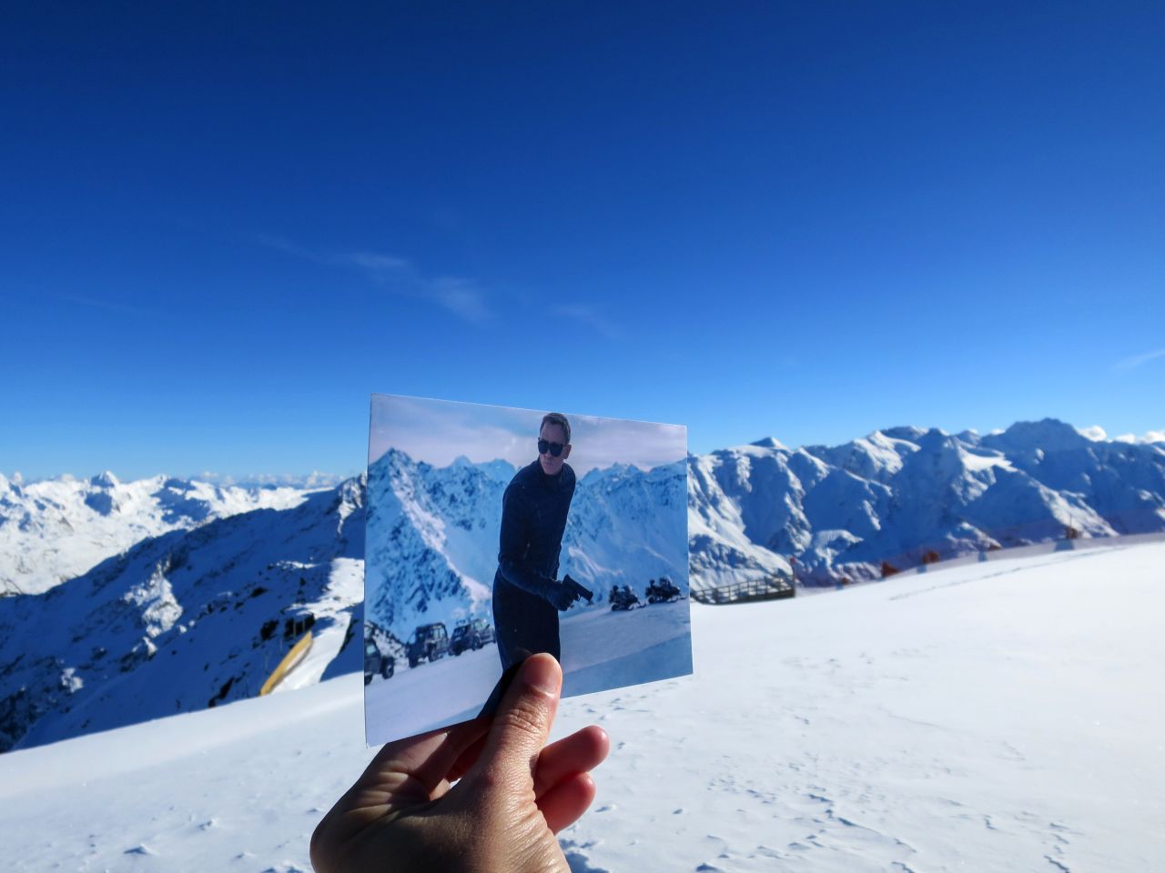 <strong>Accidental art project: </strong>David started the "photo-in-a-photo" project almost accidentally: "It's easier to ask local people about filming locations when you can show them the specific scenes," she says. "So I always carry some printed pics of the filming scenes with me." <em>Pictured here: Tyrol, Austria -- "Spectre."</em>
