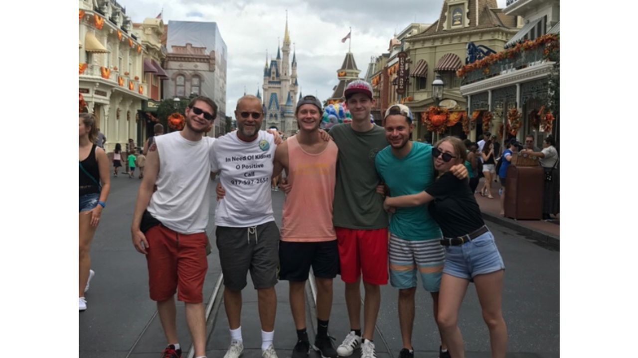 Robert Leibowitz poses with his family at Walt Disney World's Magic Kingdom.