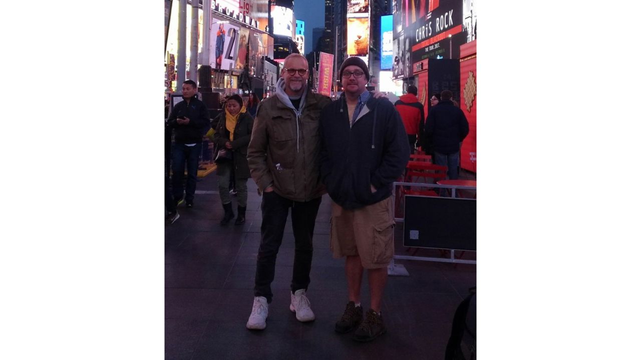 Robert Leibowitz (left) poses with his kidney donor Richie Sully in Times Square. 