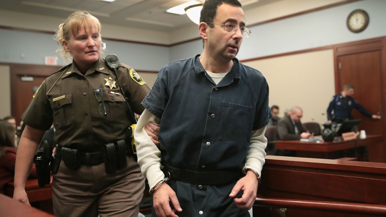 LANSING, MI - JANUARY 17:  Larry Nassar appears in court to listen to victim impact statements during his sentencing hearing after being accused of molesting more than 100 girls while he was a physician for USA Gymnastics and Michigan State University where he had his sports-medicine practice on January 17, 2018 in Lansing, Michigan. Nassar has pleaded guilty in Ingham County, Michigan, to sexually assaulting seven girls, but the judge is allowing all his accusers to speak. Nassar is currently serving a 60-year sentence in federal prison for possession of child pornography.  (Photo by Scott Olson/Getty Images)