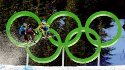 VANCOUVER, BC - FEBRUARY 21:  (L-R) Filip Flisar of Slovenia, Christopher Delbosco of Canada and Tommy Eliasson of Sweden compete in a men's ski cross race on day ten of the Vancouver 2010 Winter Olympics at Cypress Mountain Resort on February 21, 2010 in Vancouver, Canada.  (Photo by Cameron Spencer/Getty Images)