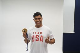 Rico Roman with his 2014 Paralympic Gold Medal 